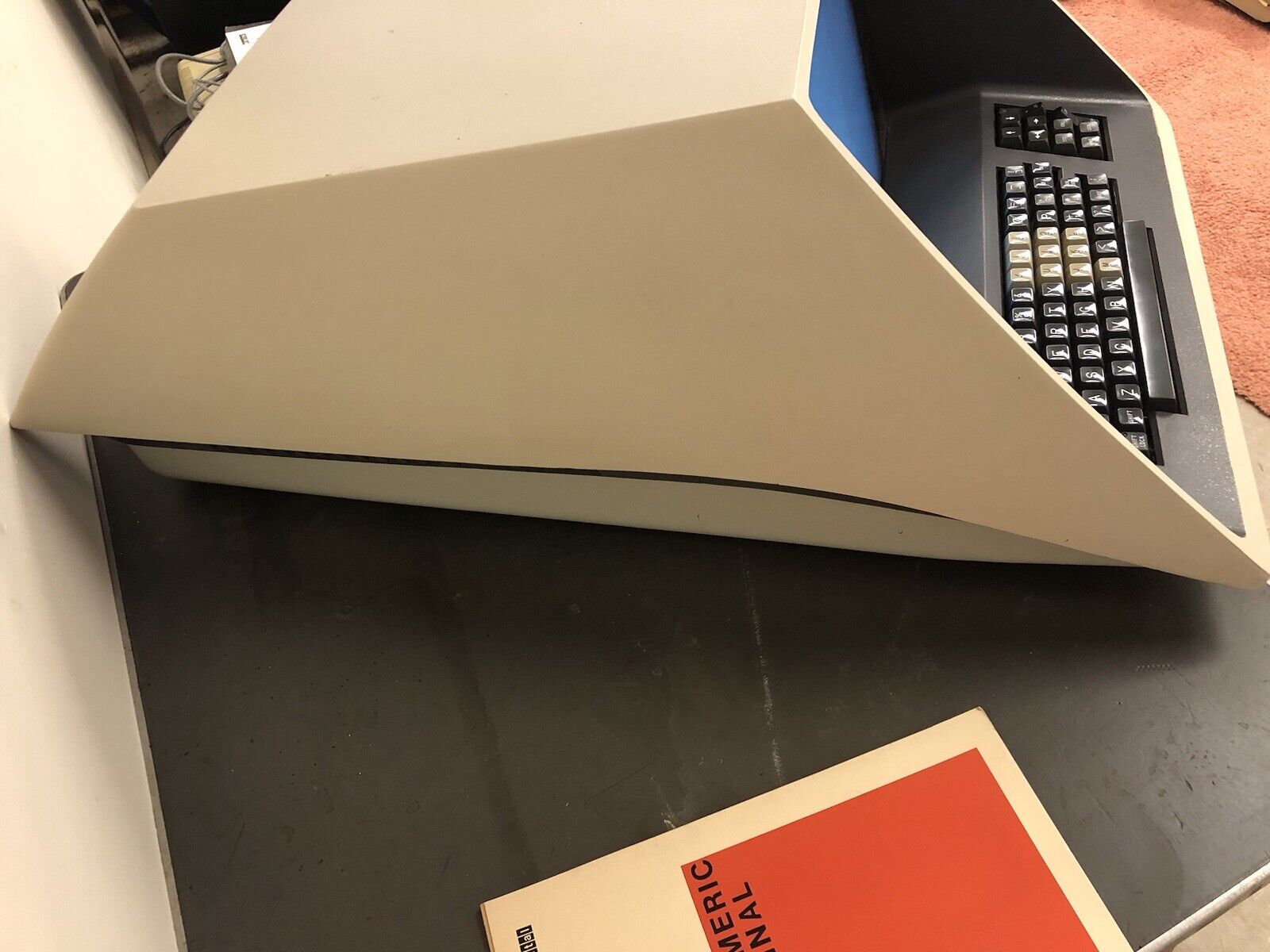 A side view of a DEC VT05, showing the distinctive shape.